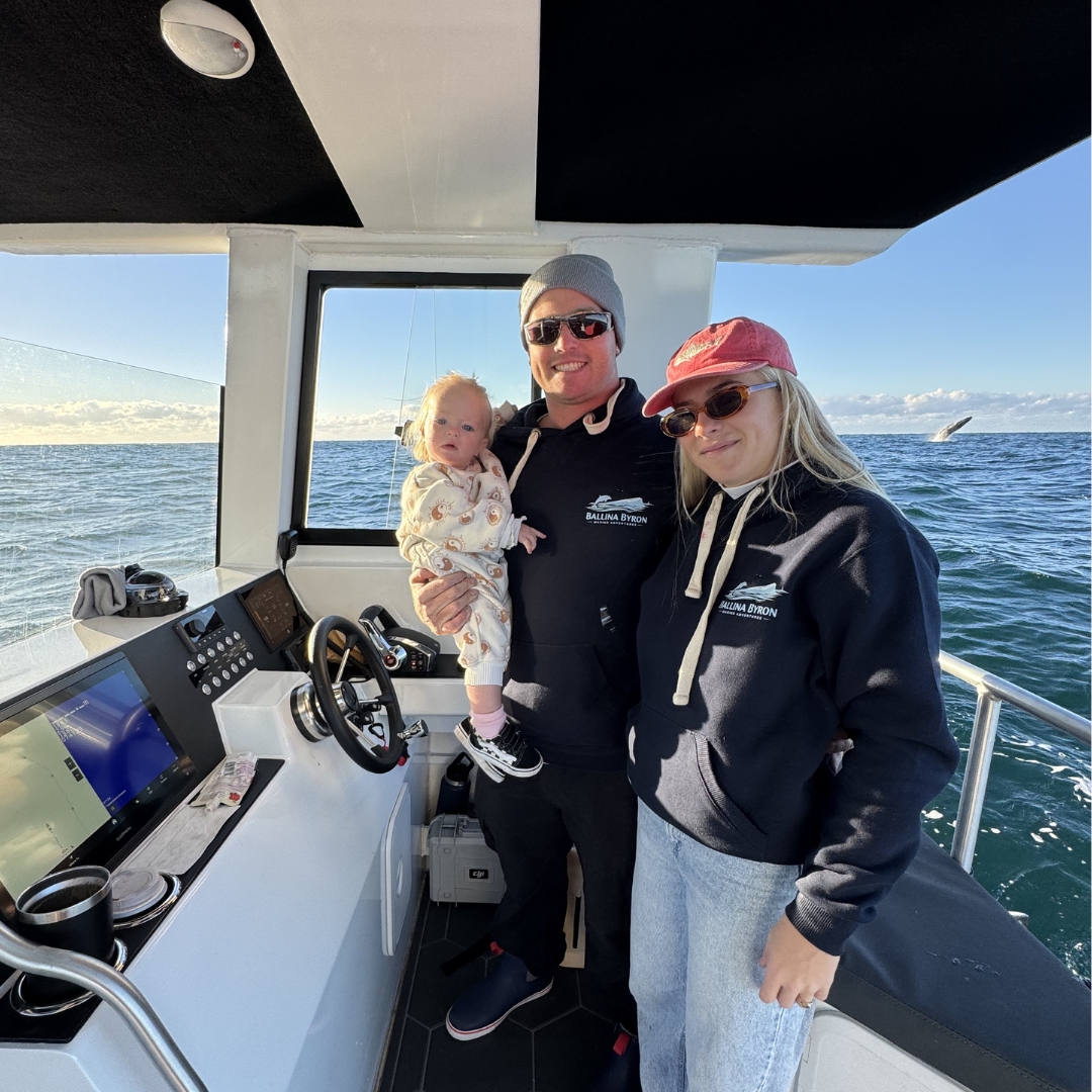 Angus, Cori and their daughter Sayla onboard Ballina Byron Marine Adventures