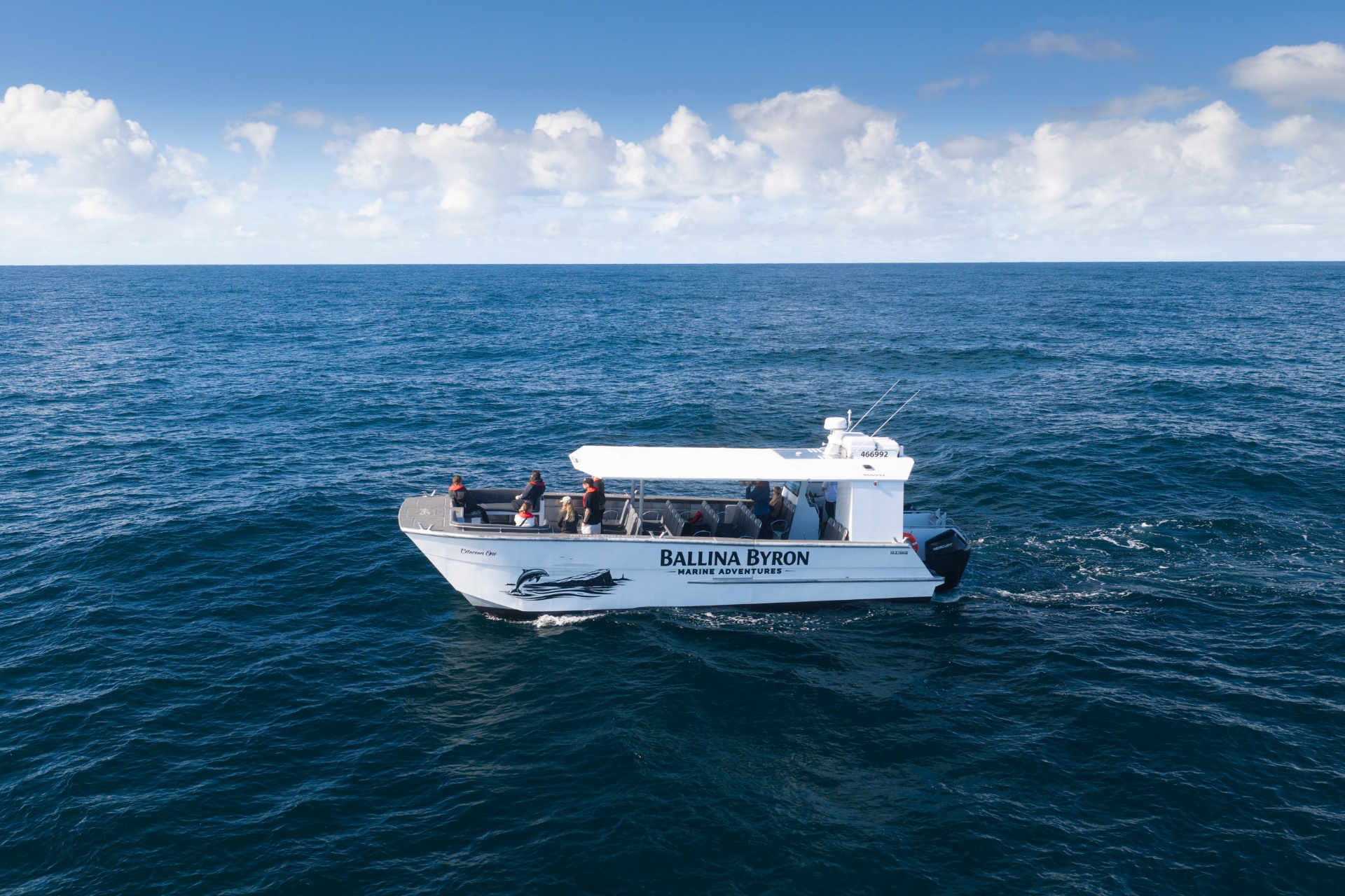 Cetacean One catamaran under way on open ocean off Ballina